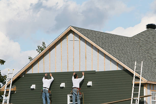 Professional Emergency Siding Repair technician working in Rushsylvania, OH